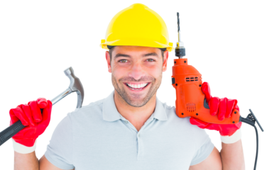 Happy repairman holding hammer and drill machine