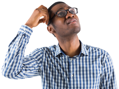 Young businessman thinking scratching head