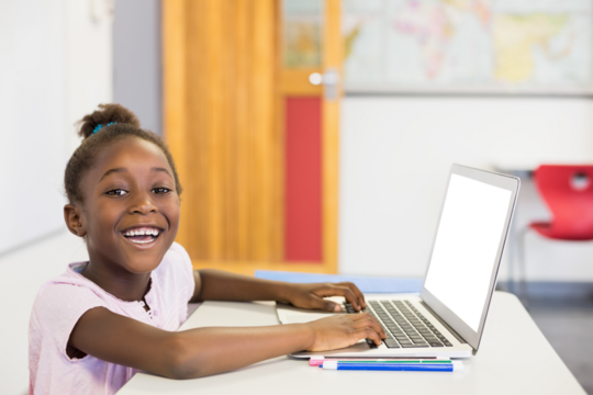 Portrait of girl using laptop