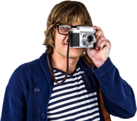 Hipster taking pictures with an old camera 