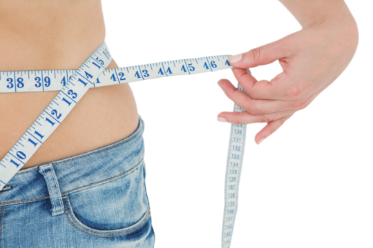 Woman measuring her waist