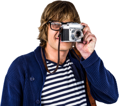 Hipster taking pictures with an old camera 