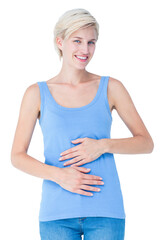 Happy woman touching her belly 