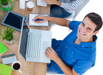 Creative businessman smiling at the camera 