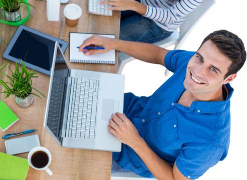 Creative businessman smiling at the camera 