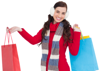 Brunette in winter clothes holding shopping bags