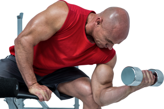 Bald man exercising with dumbbells while sitting on bench press