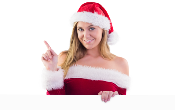 Festive blonde smiling and pointing