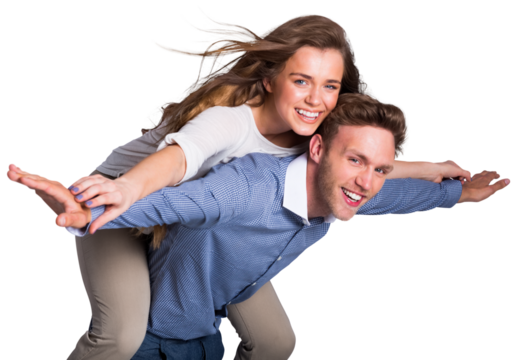 Smiling young man carrying woman