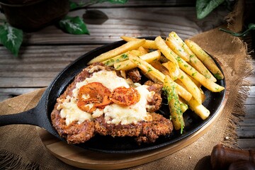 grilled pork chop with french fries