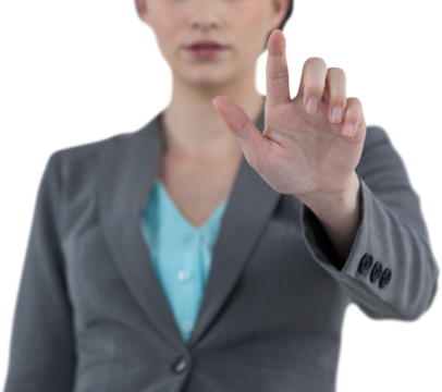 Businesswoman pointing while using digital screen