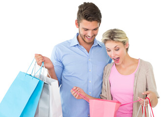 Attractive young couple holding shopping bags