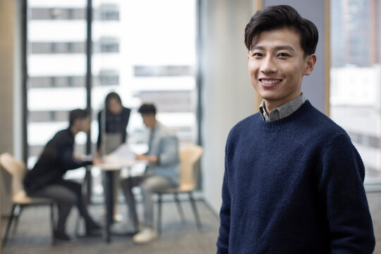 Portrait of Chinese IT worker in office