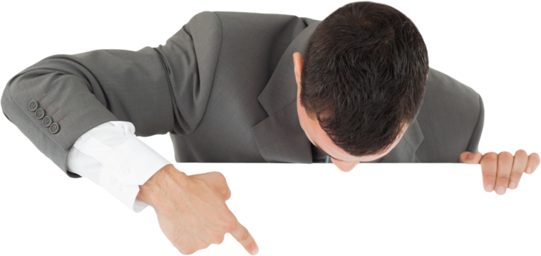 Businessman pointing on sign below him