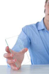 Cropped image of businessman showing glass interface