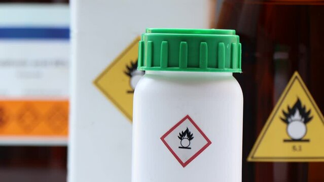 oxidizing agent symbol on bottle chemical ,warning symbol, chemical in laboratory and industry 
