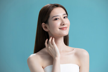 Studio shot of beautiful young Chinese woman