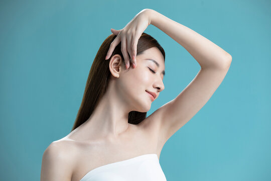 Studio shot of beautiful young Chinese woman