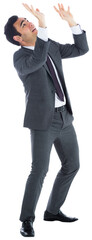 Scared businessman with arms raised