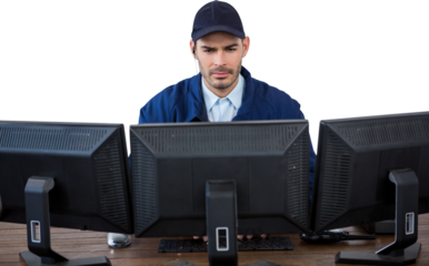 Focused security officer using computer