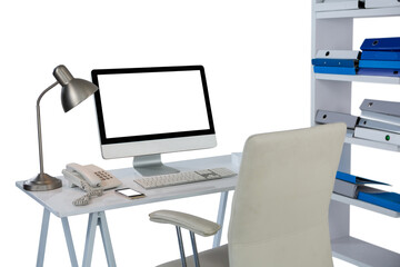 Computer with telephone and mobile phone at desk