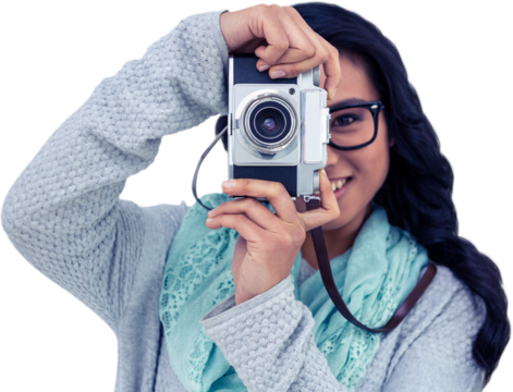Asian woman taking picture with digital camera