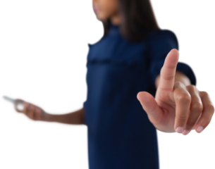 Female executive pressing an invisible virtual screen