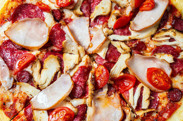 ready pizza ingredients close-up, tomatoes ham sausage