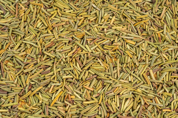 Dried rosemary spice background. Dry seasoning rosemary. Spices and herbs for cooking, provence herbs