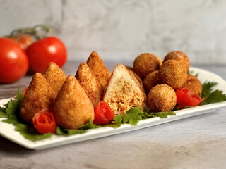 Yummy coxinhas made of shredded chicken and spices