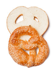 Cut fresh pretzel on light background