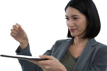 Businesswoman pretending to hold invisible object while using digital tablet