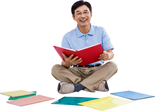 Smiling man reading books - Powered by Adobe