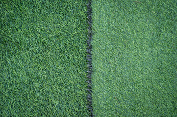 Full frame shot of green artificial turf used for covering sport arena or garden. Artificial grass...