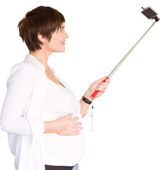 Pregnant woman using selfie stick shot