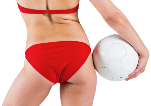 Fit girl in bikini holding football - Powered by Adobe