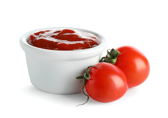 Bowl of tasty ketchup and fresh tomatoes isolated on white background