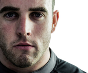 Tough rugby player looking at camera