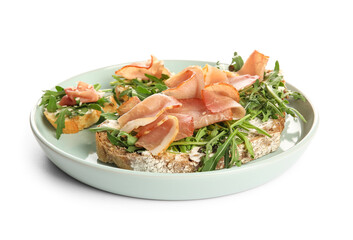 Tasty jamon bruschettas with arugula on white background
