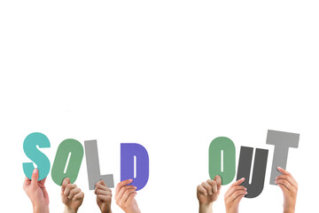 Colorful alphabet spelling sold out held up by people 