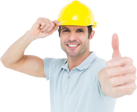 Architect wearing hardhat while showing thumbs up sign