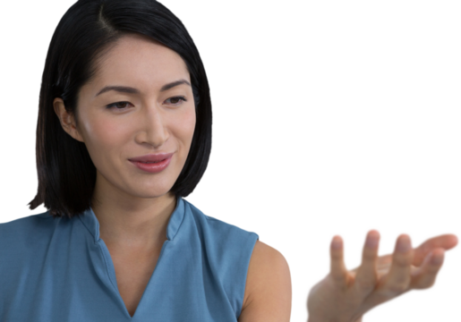 Female executive pretending to hold invisible object - Powered by Adobe
