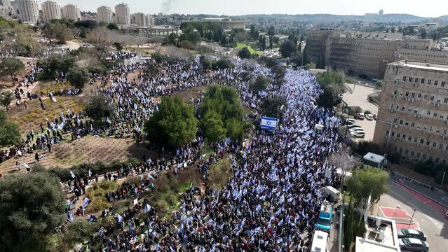 Massive protest in front of israel Knesset parliament, drone view 

Jerusalem near the Supreme Court and the Knesset against plans by prime minister new government to trample the legal system. JERUSAL