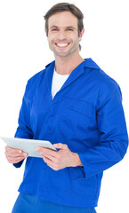 Handsome mechanic holding digital tablet