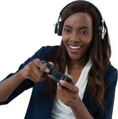 Happy businesswoman playing video game wearing headphones while playing video game 