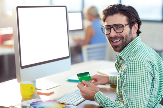 Graphic designer doing online shopping - Powered by Adobe