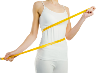 Midsection of slim woman measuring her waist