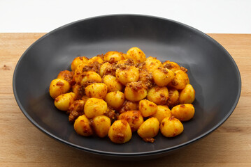 Italian Gnocchi di patate, Potato Gnocchi, with bolognese sauce.