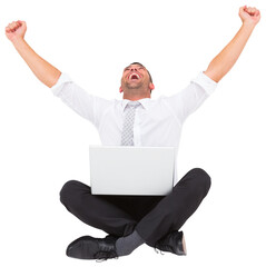 Businessman using laptop and cheering