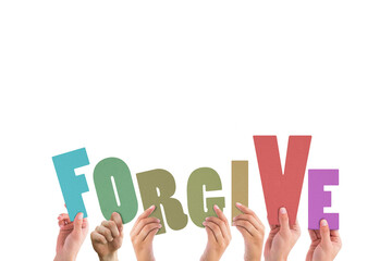 Cropped hands holding colorful word forgive  - obrazy, fototapety, plakaty